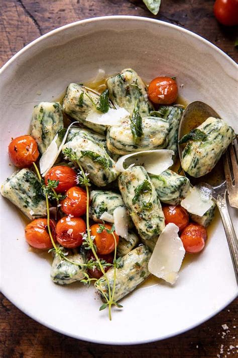 spinach-ricotta-gnocchi-with-sage-butter-and-cherry image