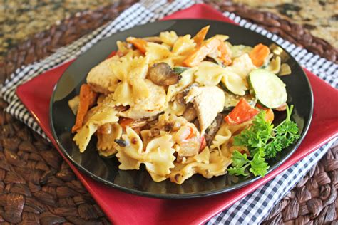 garlic-chicken-and-vegetable-bowtie-pasta-jamie image