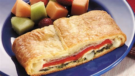 spinach-prosciutto-and-roasted-pepper-calzone image