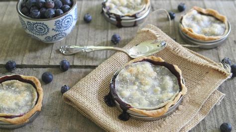 mason-jar-lid-blueberry-pies-sheknows image