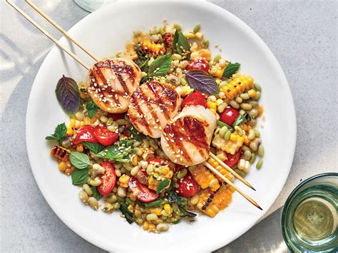 grilled-scallops-with-miso-corn-salad-recipe-food-wine image