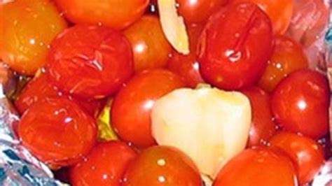 grilled-garlic-grape-tomatoes-recipe-tablespooncom image