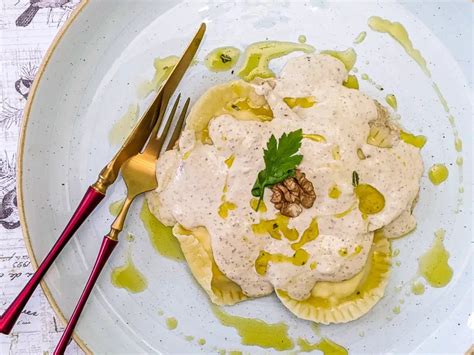 fresh-ricotta-ravioli-with-walnut-sauce-traditional image