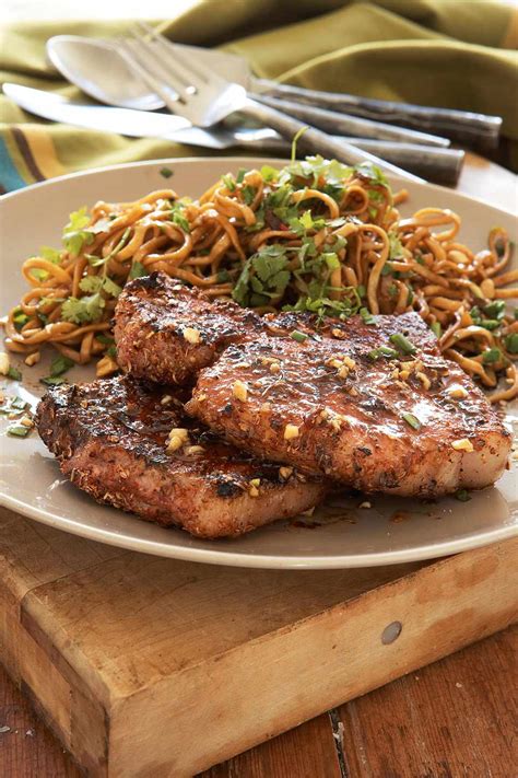 grilled-pork-chops-with-indian-spice-rub-the-spruce image