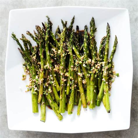 broiled-asparagus-with-soy-ginger-vinaigrette image