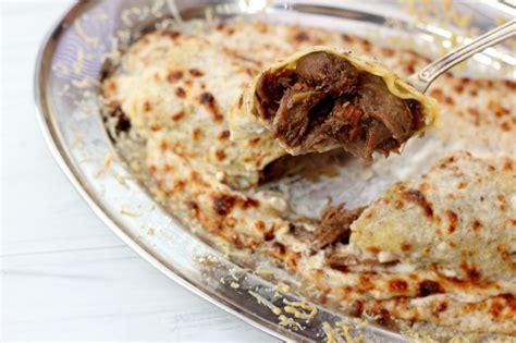 pork-cheek-cannelloni-with-truffle-cream-tapas image