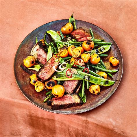 grilled-strip-steak-with-blistered-tomatoes-and-green image