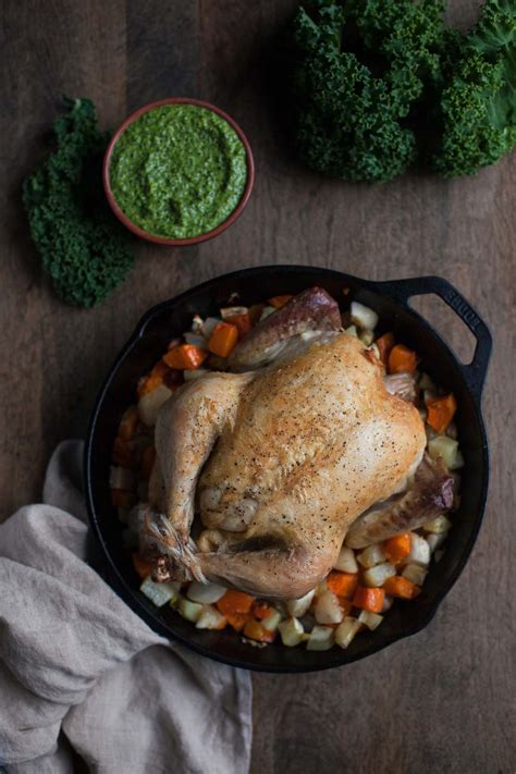 simple-roast-chicken-with-carrot-top-kale-pesto image