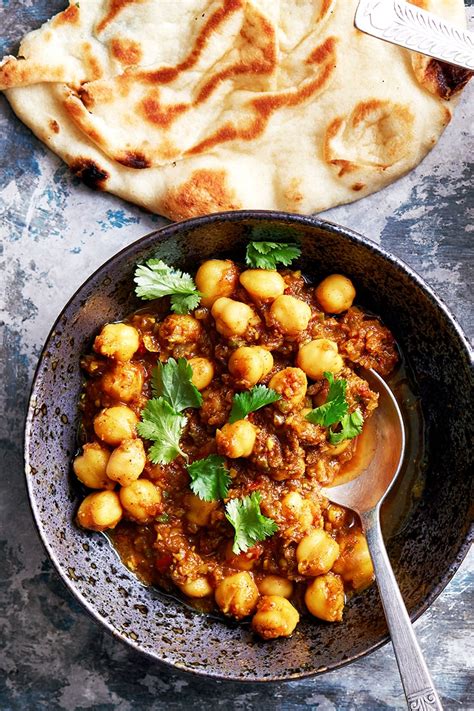 instant-pot-chickpeas-in-spicy-tomato-sauce-brown image