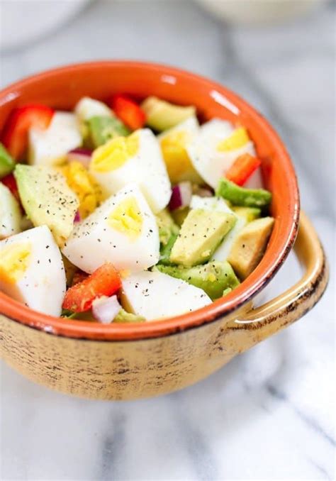 hard-boiled-egg-and-avocado-bowl-eating-bird-food image