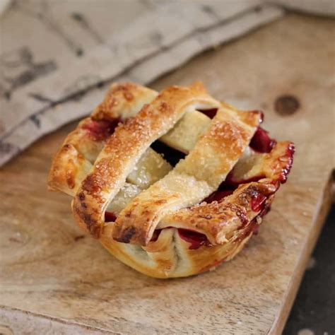 mixed-berry-pies-muffin-tin-recipe-bake image