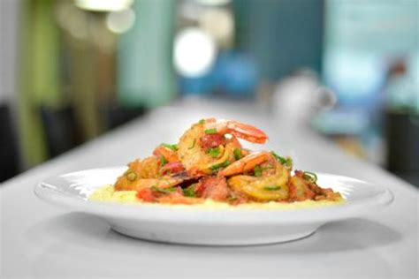 emerils-smothered-shrimp-and-andouille image