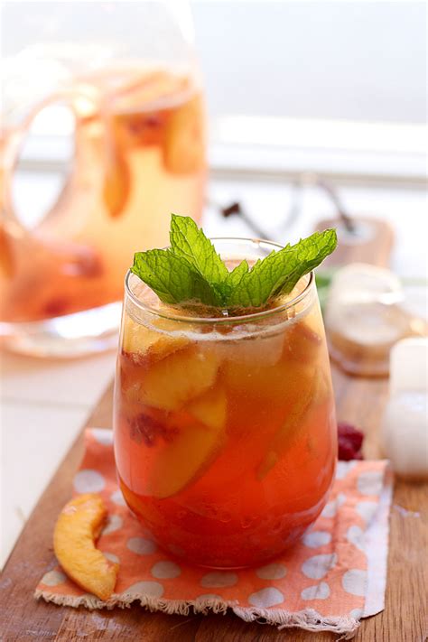 white-peach-sangria-recipe-with-mint-delightful image