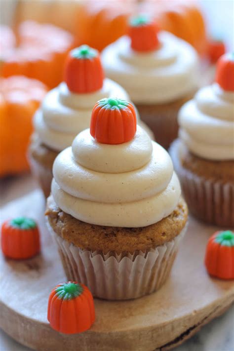 pumpkin-cupcakes-with-cinnamon-cream-cheese image