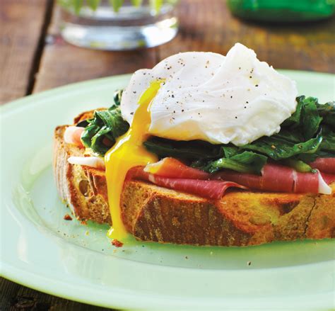 poached-eggs-over-sauted-greens-and-toast image