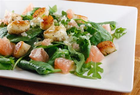 seared-scallop-salad-with-grapefruit-arugula-and-spinach image