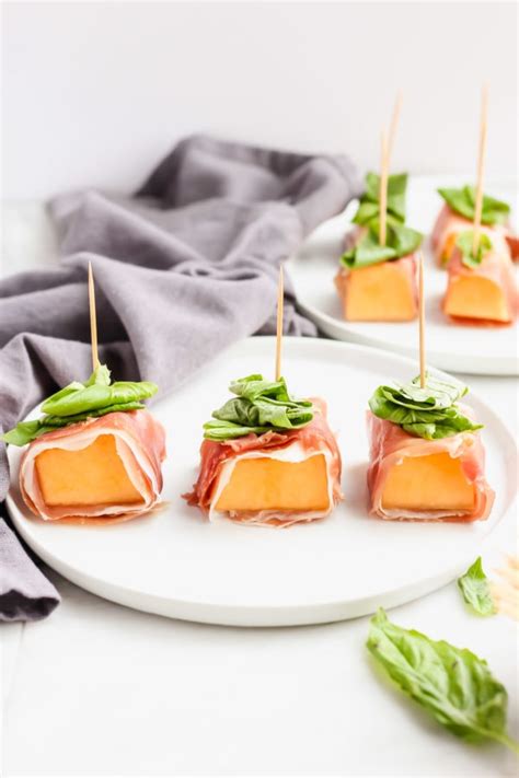 prosciutto-wrapped-melon-with-basil-the-wooden image