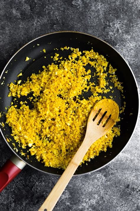 golden-turmeric-cauliflower-rice-sweet-peas-and image