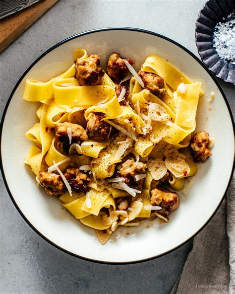 garlic-parmesan-pasta-with-sausage-i-am-a-food-blog image