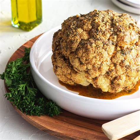 whole-roasted-cauliflower-with-almond-herb-sauce image