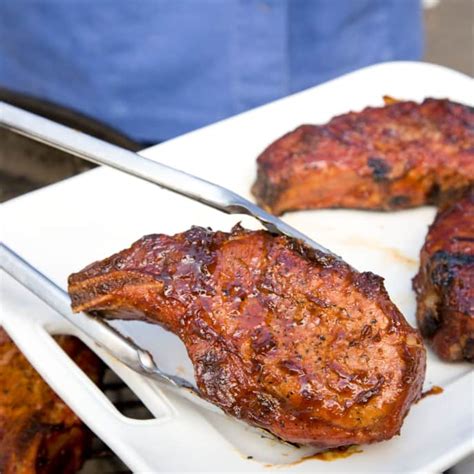 best-charcoal-grill-smoked-pork-chops-americas-test image