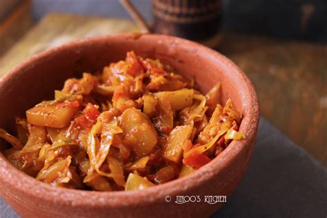 cabbage-curry-with-potatoes-bengali-style-bandh-gobhi-aloo-sabzi image