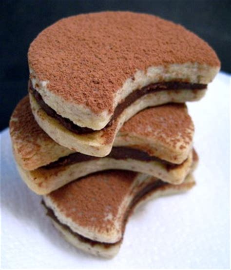chocolate-almond-cream-sandwich-cookies-baking image