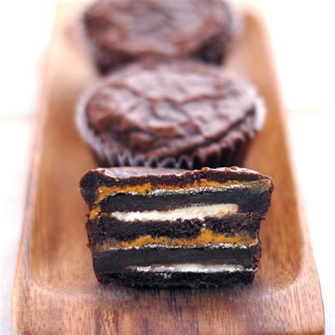 brownie-and-peanut-butter-covered-oreo-cupcakes image