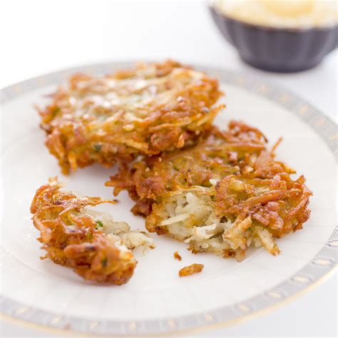 crispy-potato-latkes-americas-test-kitchen image