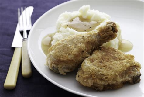 southern-fried-chicken-with-mashed-potatoes-and-gravy image
