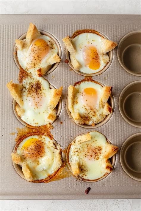 baked-eggs-in-bread-feelgoodfoodie image