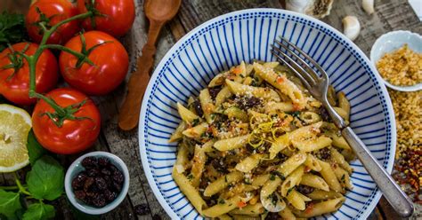 pasta-with-pine-nuts-raisins-and-tomatoes image