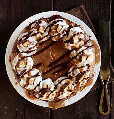 snickers-cheesecake-cake-i-am-baker image