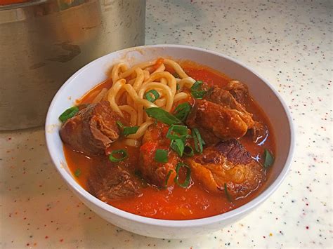 haidilao-tomato-beef-soup-recipe-with-noodle image