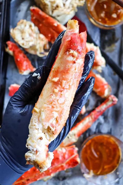 grilled-king-crab-legs-with-garlic-butter-seafood-sauce image