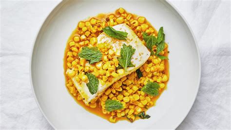 saucy-spiced-cod-with-corn-recipe-bon-apptit image
