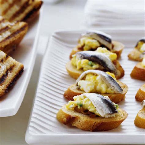 egg-salad-crostini-with-white-anchovies-food-wine image