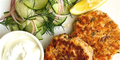 salmon-cakes-with-cucumber-dill-salad-delish image