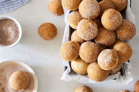 cinnamon-baked-doughnut-holes-recipe-king-arthur image