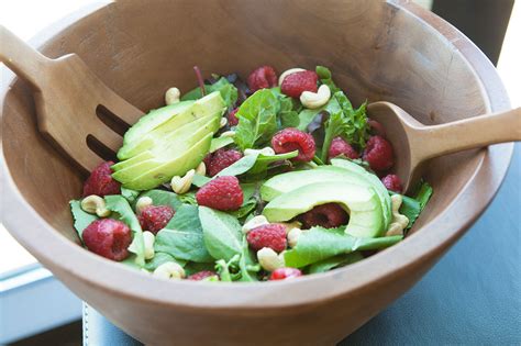 mixed-greens-with-raspberries-and-cashews image
