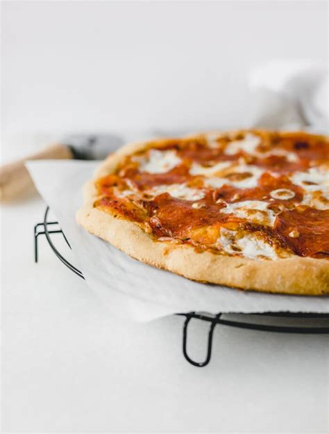 easy-whole-wheat-pizza-crust-lively-table image