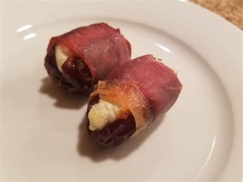 dates-stuffed-with-goat-cheese-and-wrapped-in-prosciutto image