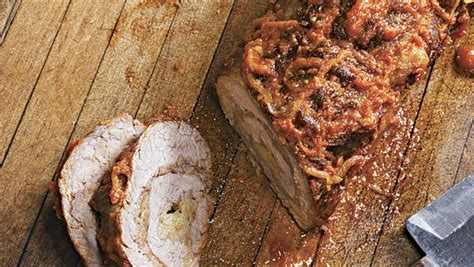 braised-beef-braciola-stuffed-with-basil-and-mozzarella image