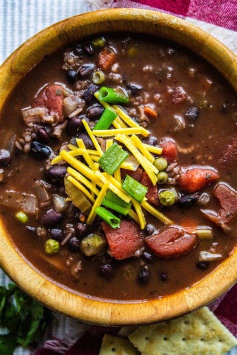 slow-cooker-black-bean-and-rice-soup-bad-to-the-bowl image