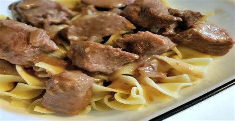 easy-slow-cooker-beef-tips-noodles image