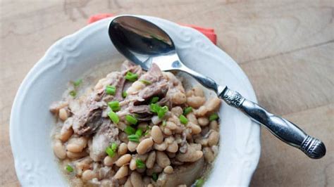 crock-pot-ham-and-white-beans-recipe-all-she-cooks image