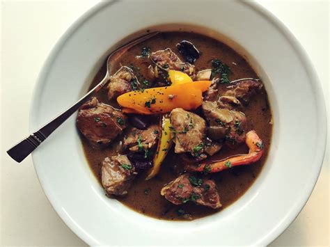pork-stew-with-peppers-and-olives-three-many-cooks image