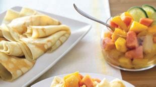 tropical-fruit-crepes-with-vanilla-bean-and-rum-butter image