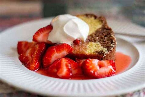 banana-split-cake-with-strawberry-sauce-shes-not image