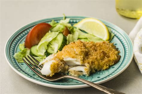 parmesan-crusted-baked-fish-fillet-recipe-the-spruce image